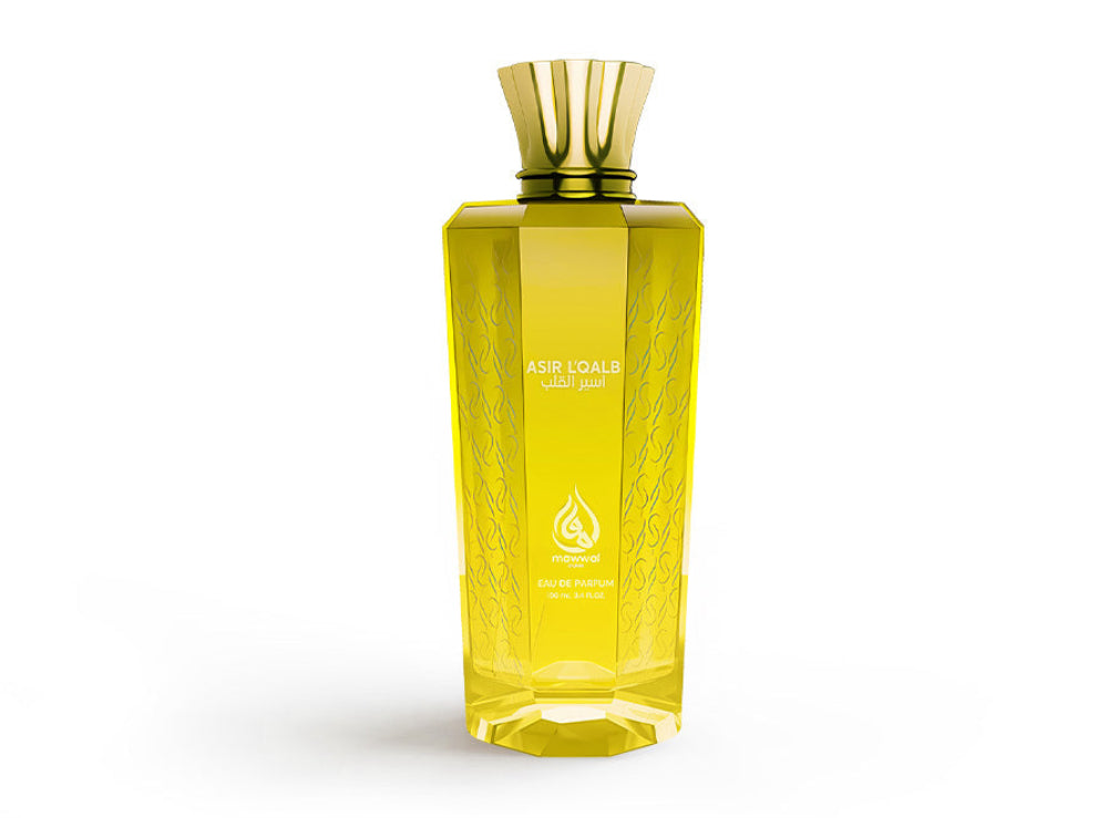 Asir LQalb Eau de Parfum (100ml) - Citrus woody unisex fragrance in an elegant yellow bottle.