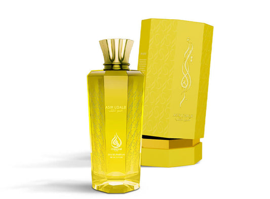 Asir LQalb Eau de Parfum (100ml) - Citrus woody unisex fragrance in an elegant yellow bottle.