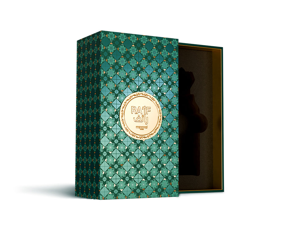 Raif Eau de Parfum elegantly packaged in a luxurious green box with gold accents, showcasing its bold design.